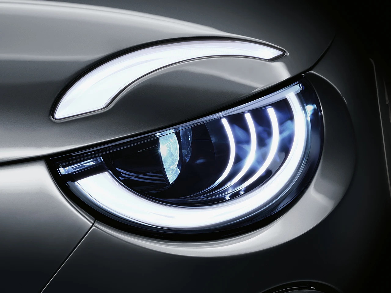 Fiat 500e 42 kWh headlights view