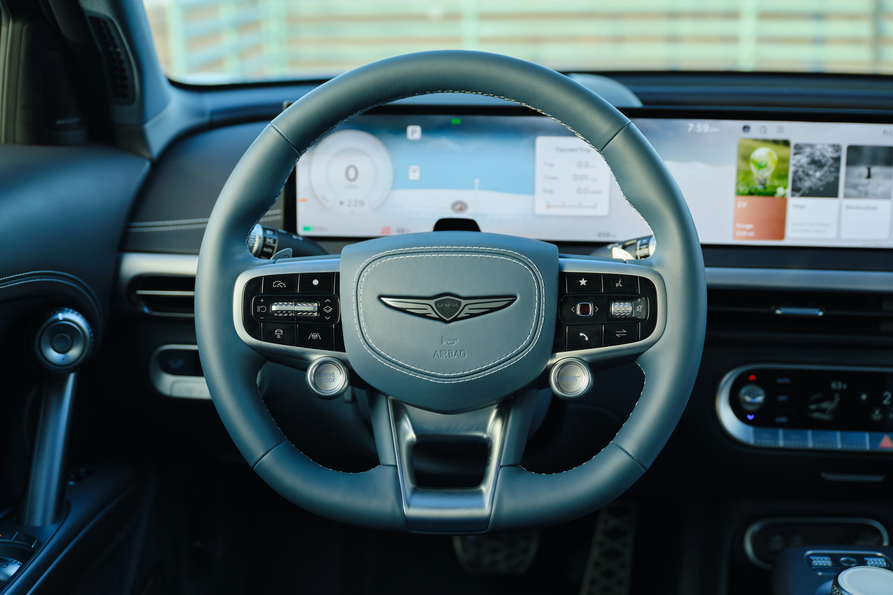Genesis GV60 2026 AWD steeringwheel view