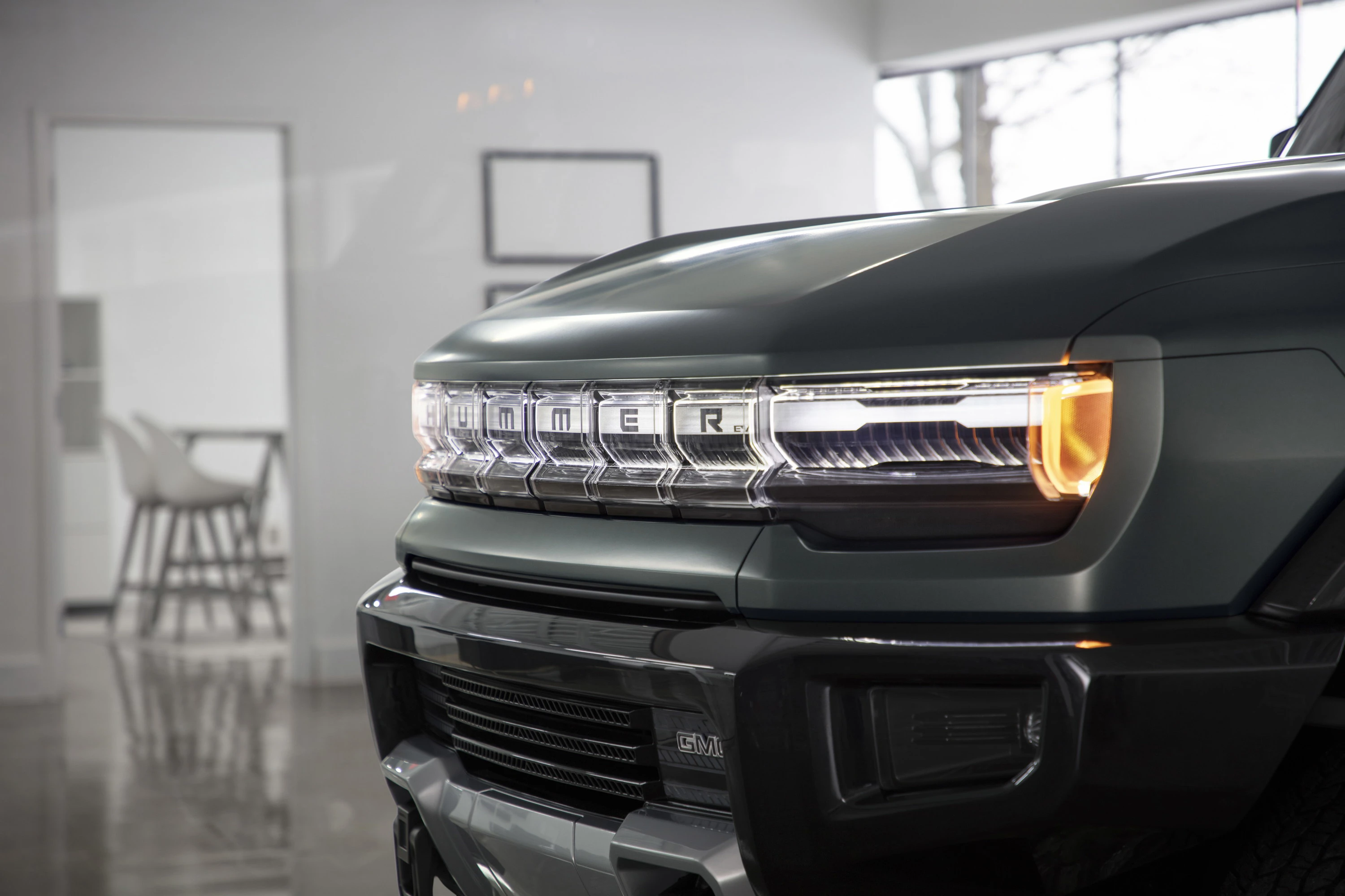 GMC Hummer EV SUV 2x headlights view