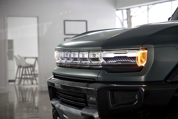 GMC Hummer EV SUV 2x headlights view