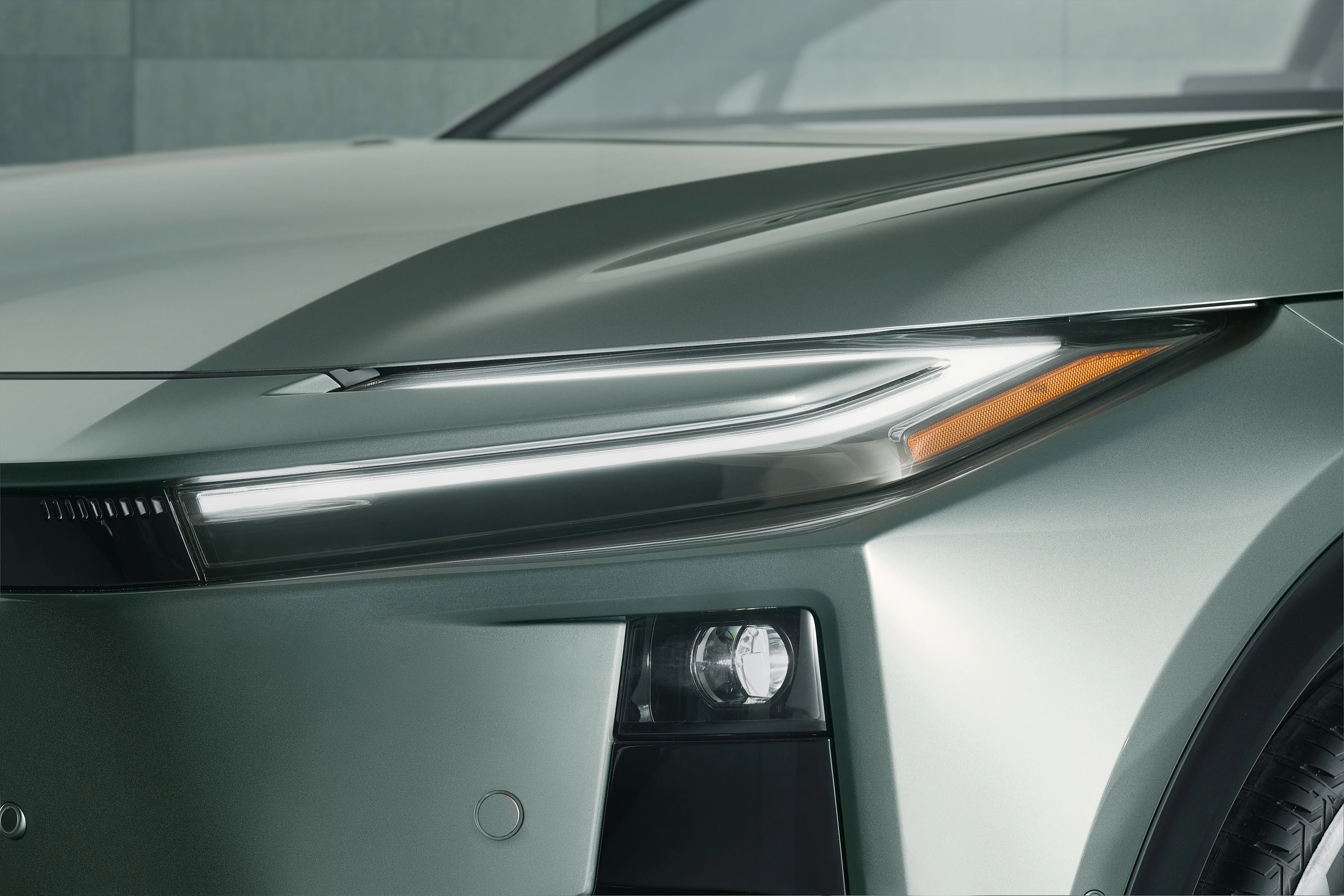 Toyota C-HR+ 77 kWh headlights view