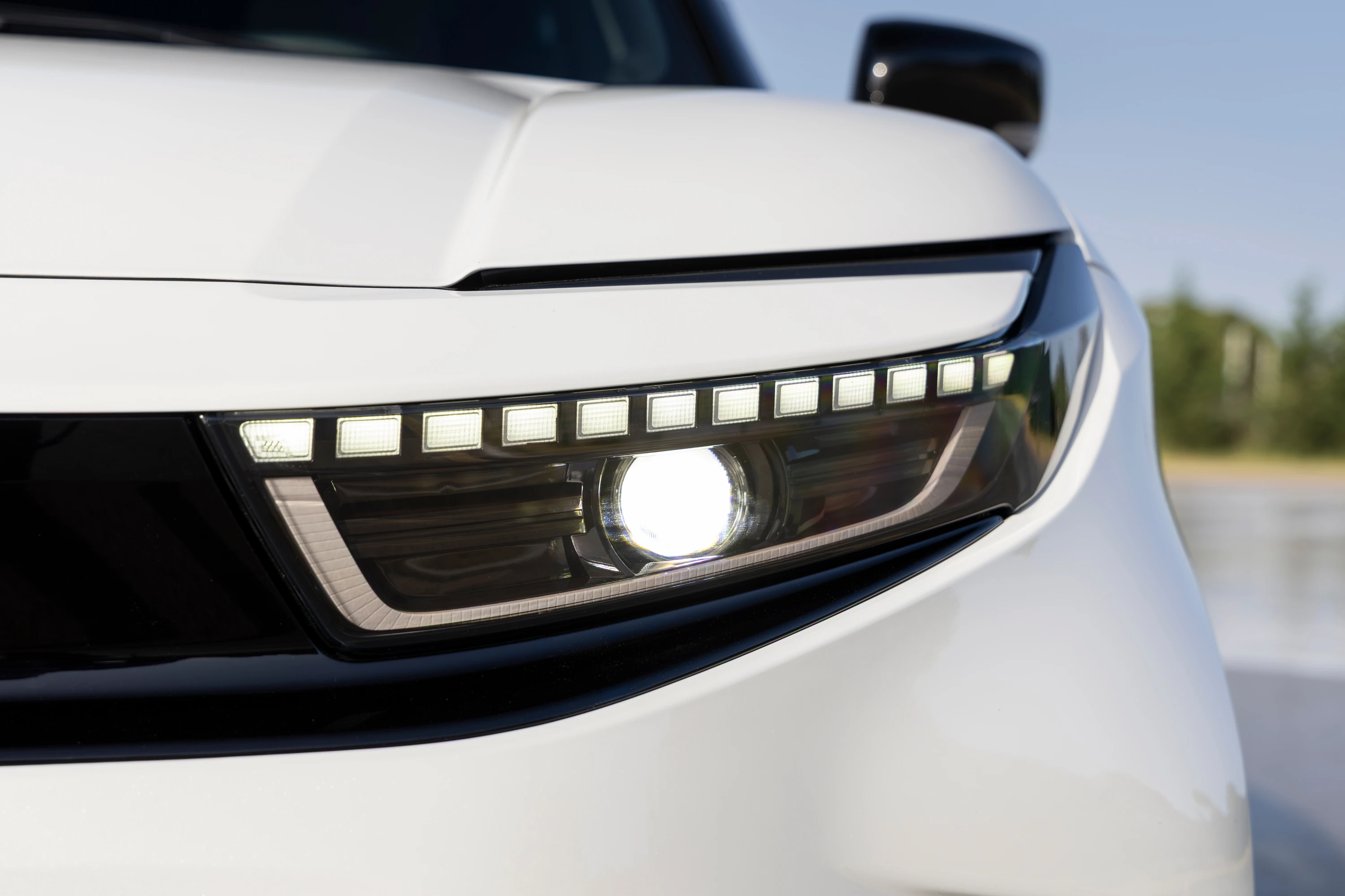 Toyota Urban Cruiser 61.1 kWh FWD headlights view