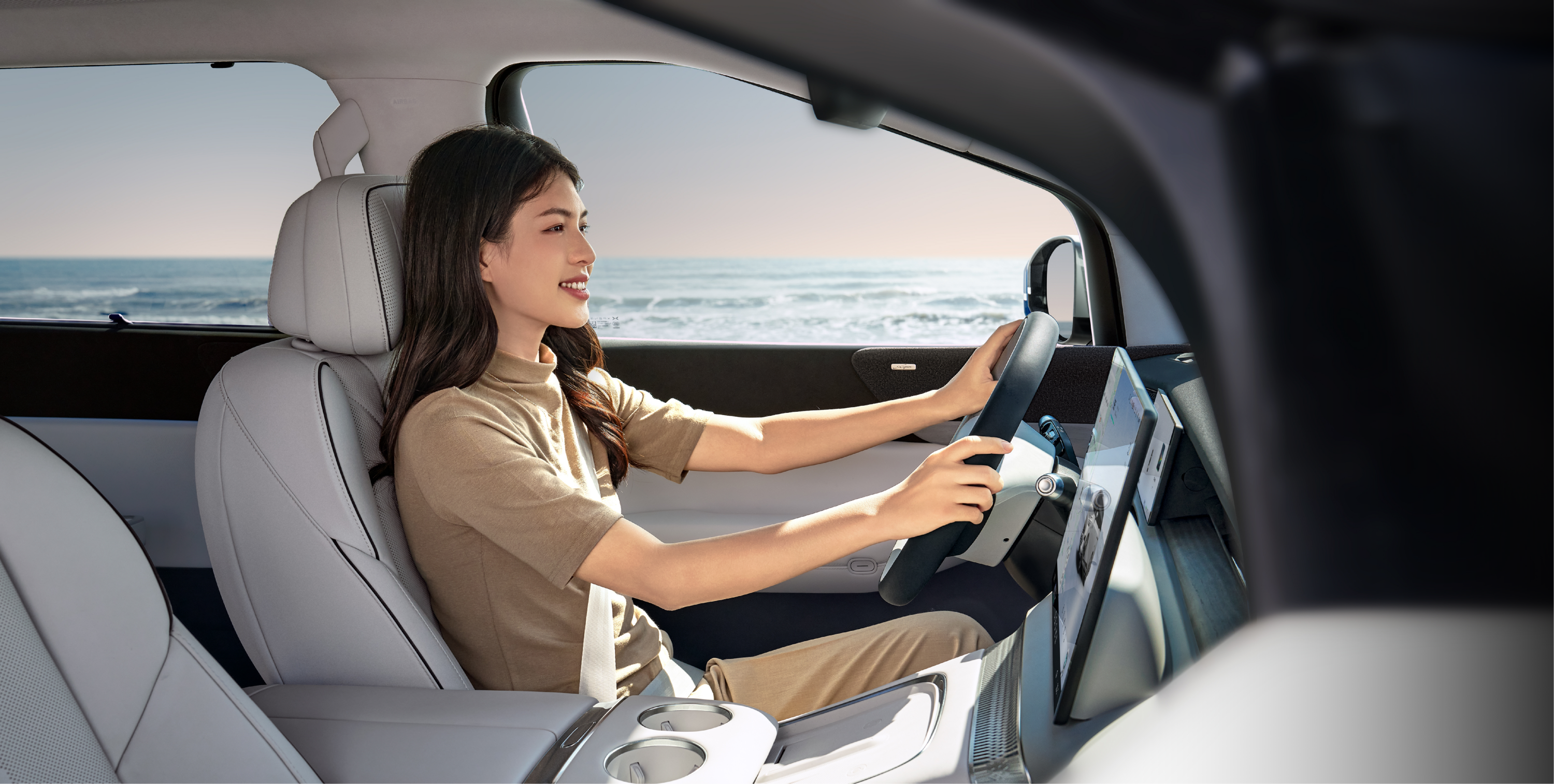 XPENG X9 FWD Long Range frontseats view